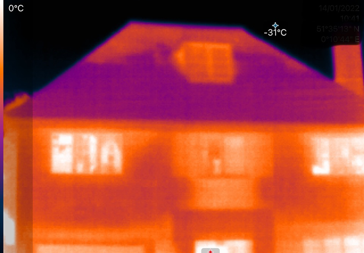 Thermal Imaging picture showing heat loss through the roof